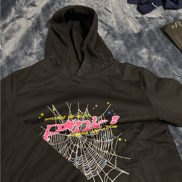 Released in August 2021 the Sp5der P*nk Hoodie features a pink punk graphic.